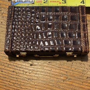 Tiny crocodile card holder.